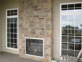 inside/outside stone fireplace